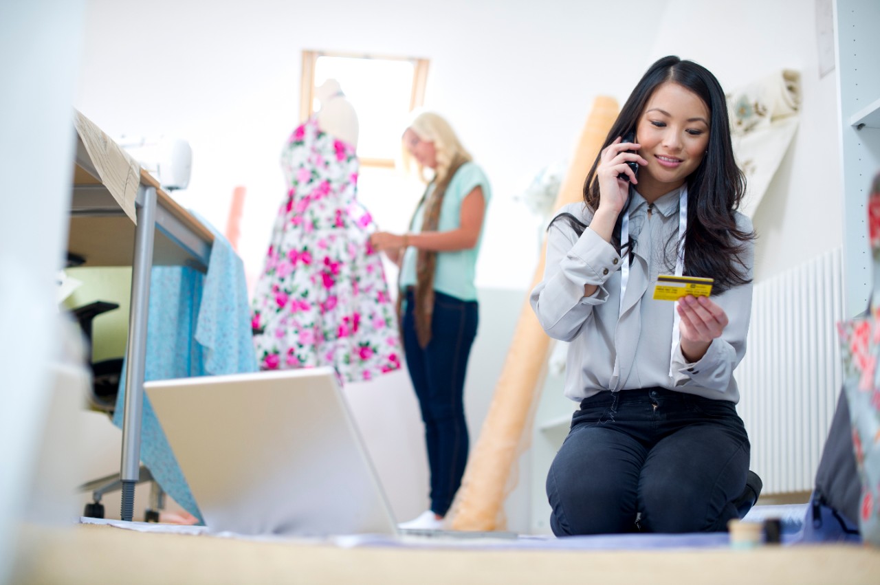 young female buying supplies over the phone
