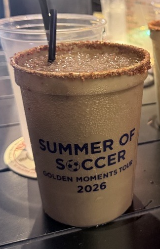 brown cocktail in a brown cup